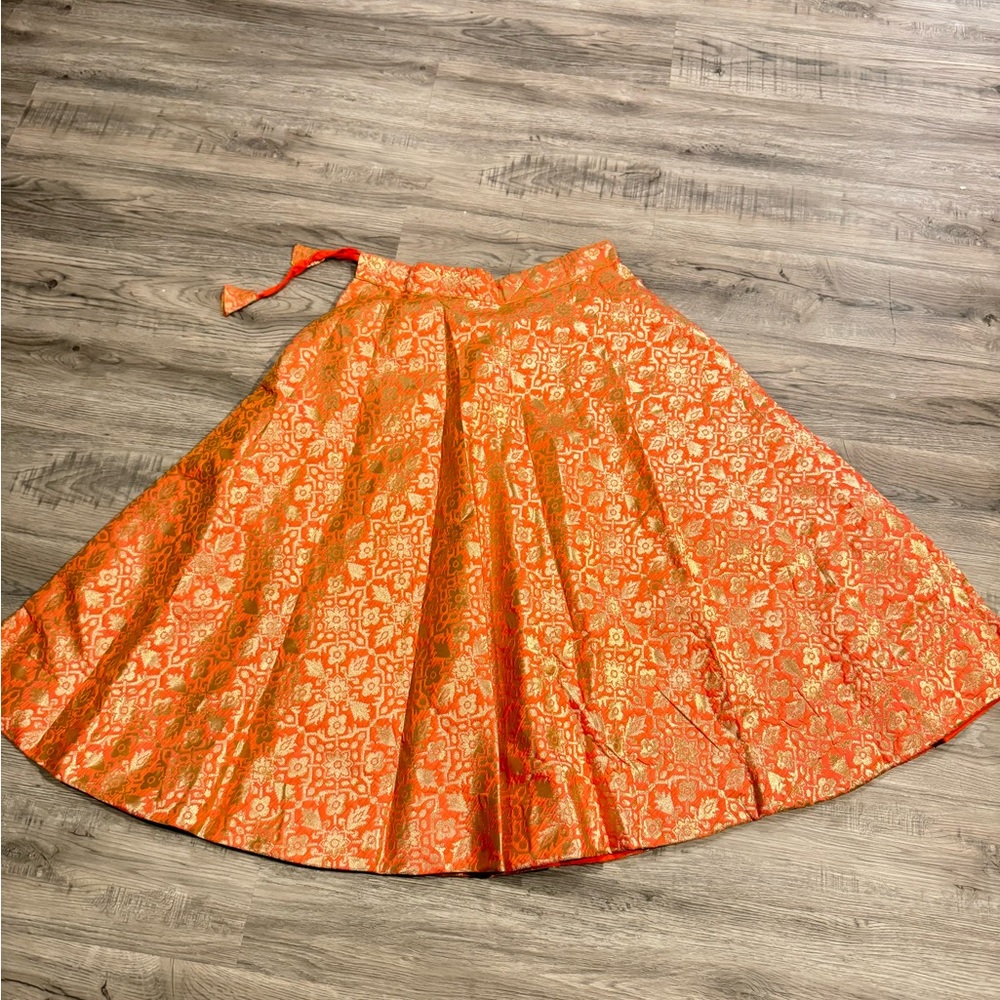 Orange and gold lengha choli chanya